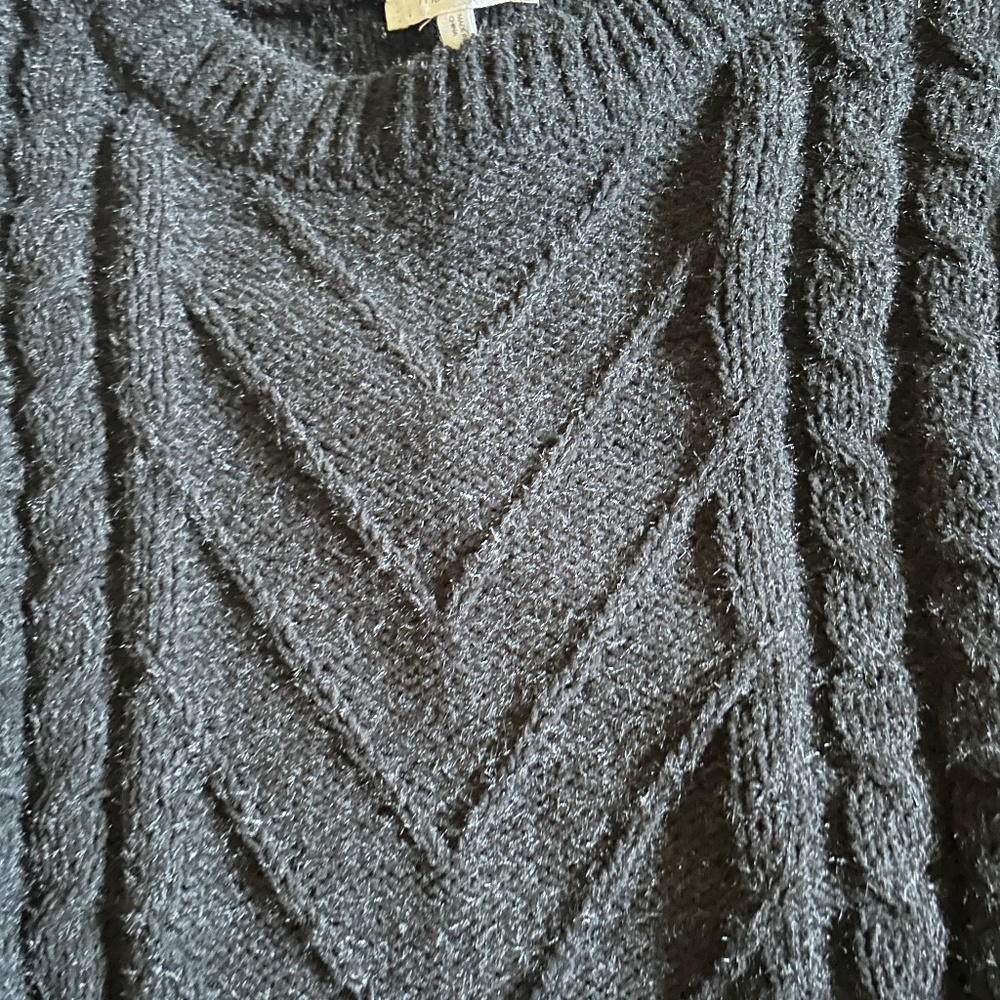 Maurice’s black sweater